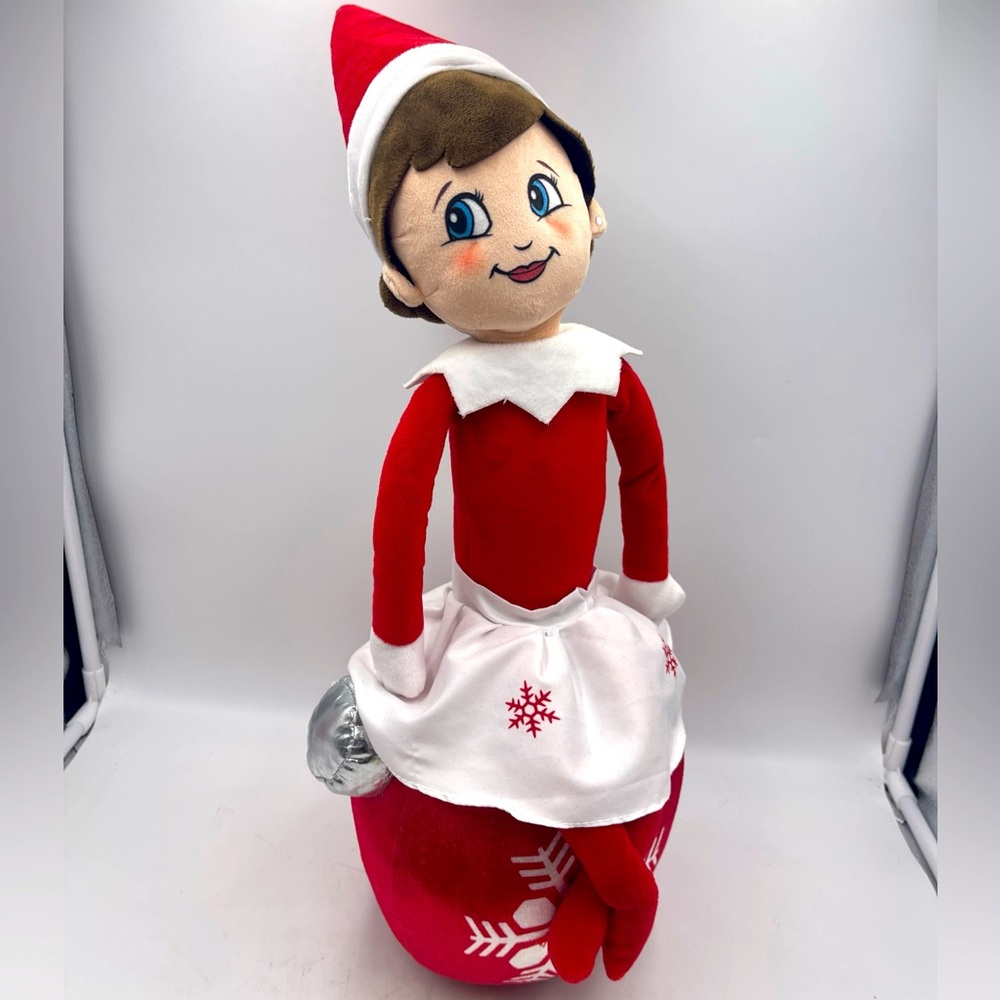 Elf on the Shelf a Christmas Tradition: Red & White Plush Sitting on an Ornament
